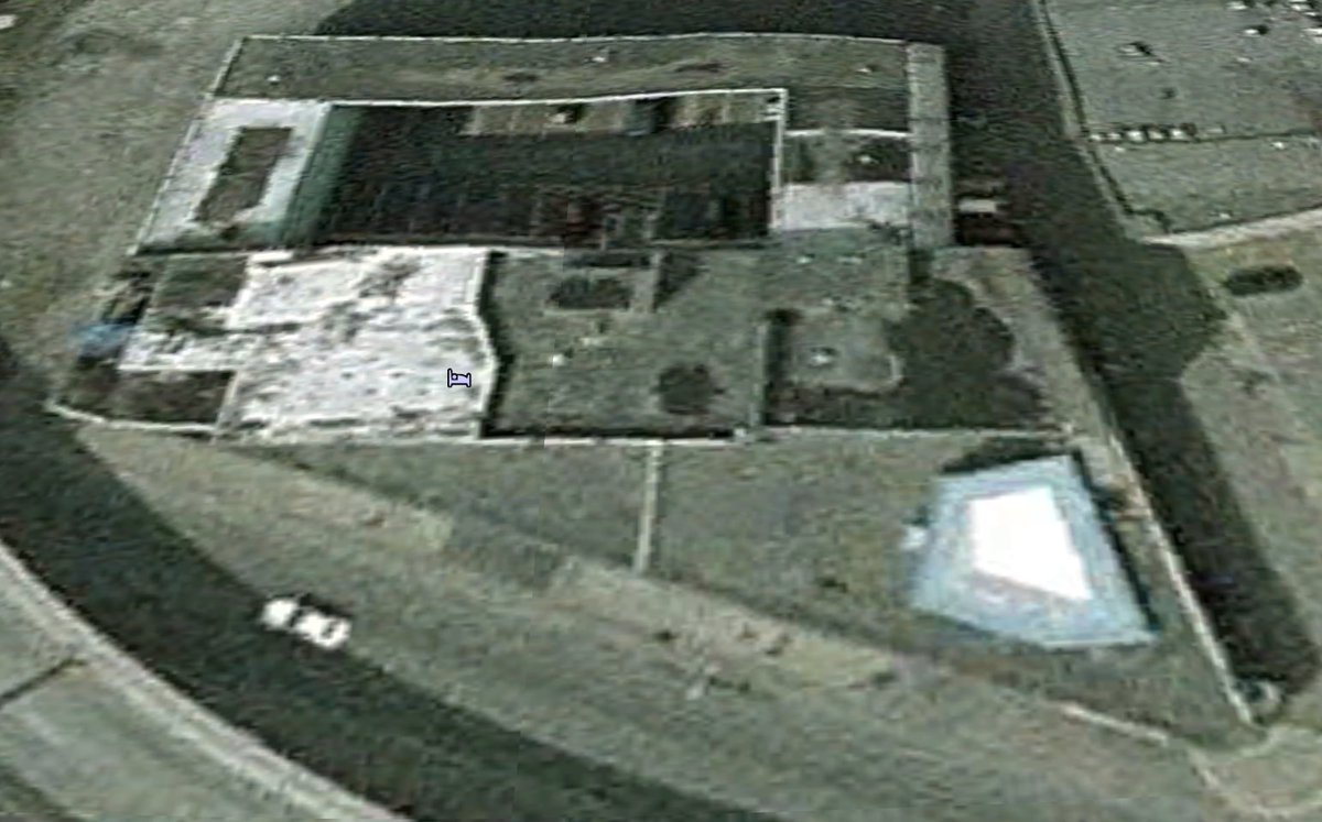 So I did some Google Earth digging. The pool's visible in April 2004. It's that blue and white thing in the bottom right corner. 3/