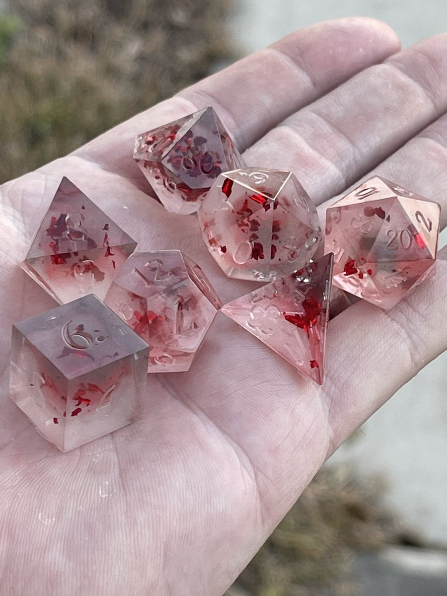 AlkeshOne's tweet photo. Latest pull from my @WerpyDice molds. A bit of black mica, a bit of white alcohol ink, white mica powder, and a bunch of metallic red leaf. WIP
#resindice #handmadedice #resin #dice #dicegoblin #dnd #dnddiceset #dnddice #diceset #polyhedradice #resinart #dicemaking #tabletopdice https://t.co/OMEiK4nn5f