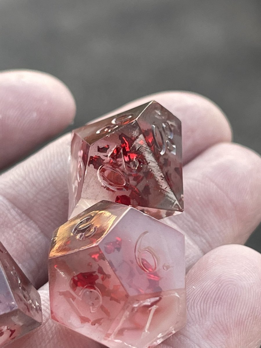 AlkeshOne's tweet photo. Latest pull from my @WerpyDice molds. A bit of black mica, a bit of white alcohol ink, white mica powder, and a bunch of metallic red leaf. WIP
#resindice #handmadedice #resin #dice #dicegoblin #dnd #dnddiceset #dnddice #diceset #polyhedradice #resinart #dicemaking #tabletopdice https://t.co/OMEiK4nn5f