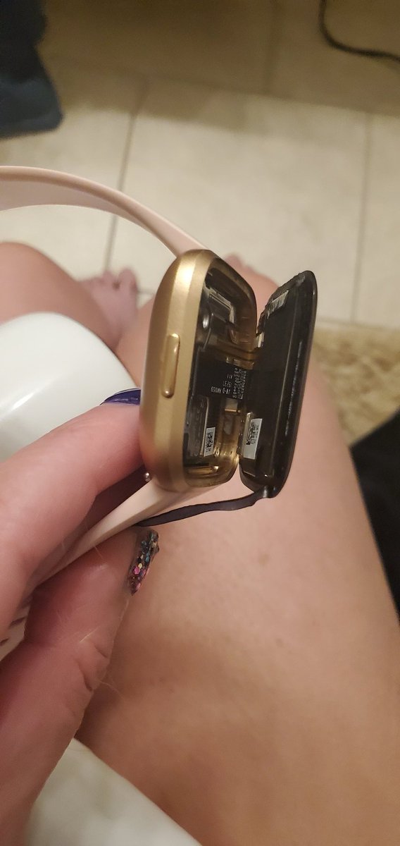 NonsensicalStef's tweet photo. @FitbitSupport i was blow drying my hair, heard a clacking noise, stopped and looked and the face is hanging off my fitbit! Its never been dropped. What can be done? https://t.co/XbUpDxDvrz