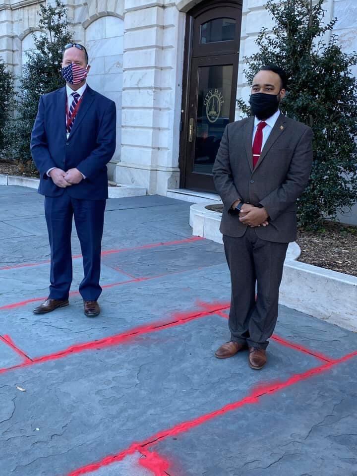 bMOREsafeMercy's tweet photo. Mercy FNE’s Debbie Holbrook and JS Beatty participating in the #RedSandProject along with Baltimore’s own Kristopher Burnette and Thomas Stack in front of City Hall for #HumanTraffickingAwarenessMonth https://t.co/hVc9GQaQ8R