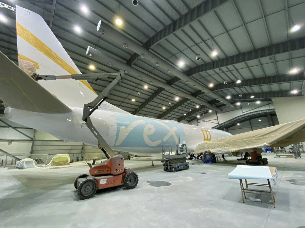 RexAirlines's tweet photo. Another sneak peek into VH-RQG painting progress to keep you Rexcited! 
✅The wings have been painted
✅White base coat completed
✅Livery and mandatory markings have been applied 

#rexairlines 
#ourheartisinthecountry https://t.co/ZueZuvQgYN