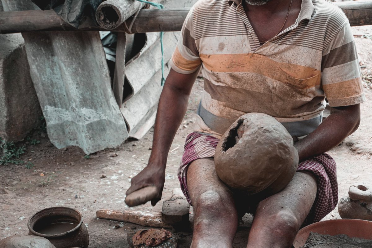 Kumbharpada thread 2Making these clay cooking pots called Kudhua for the Temple Kitchens is what the potters of Kumbharpada at Puri have been practicing for centuries.This is something that has been passed on for generations in this place and it's a very special style of clay