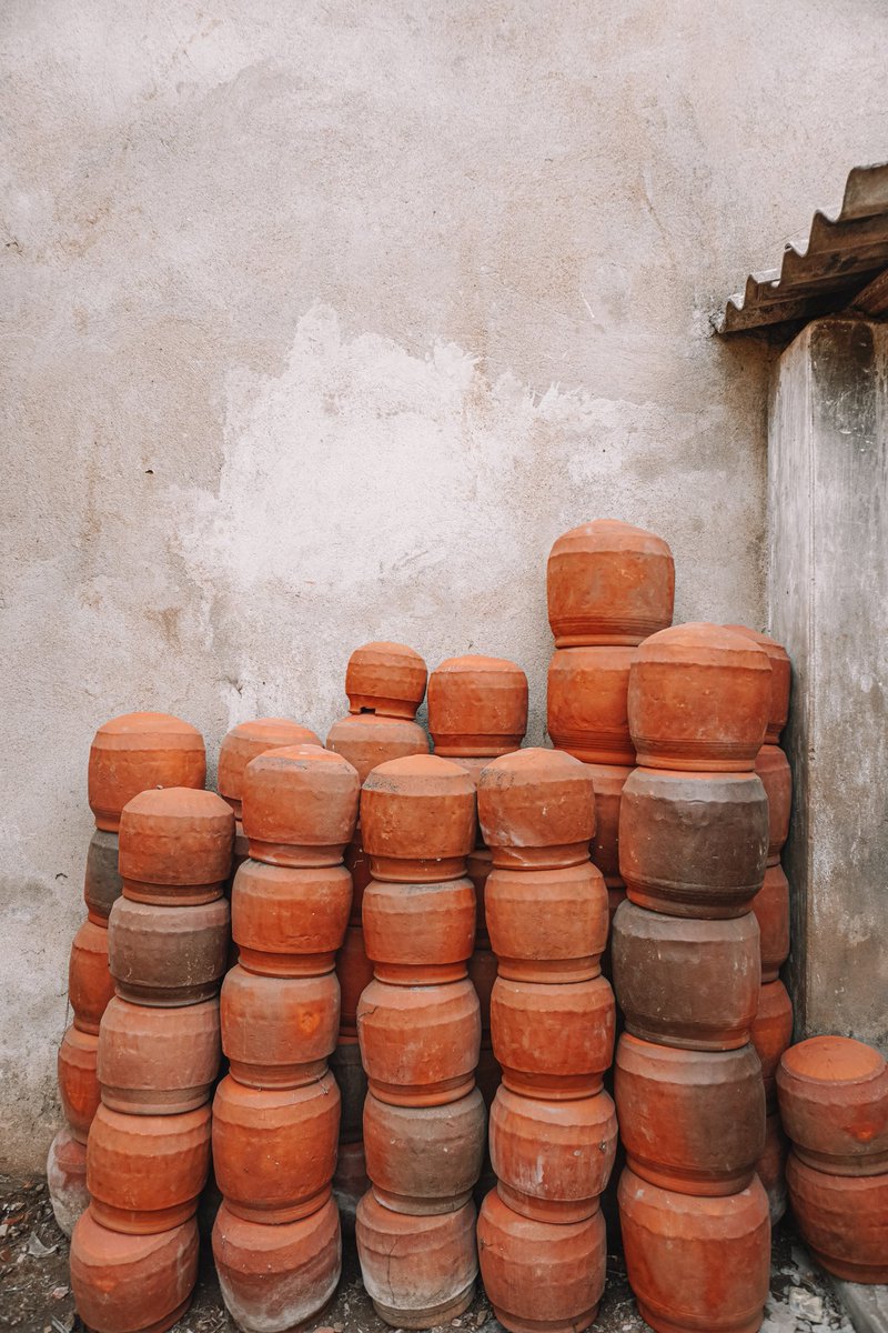 Kumbharpada thread 2Making these clay cooking pots called Kudhua for the Temple Kitchens is what the potters of Kumbharpada at Puri have been practicing for centuries.This is something that has been passed on for generations in this place and it's a very special style of clay
