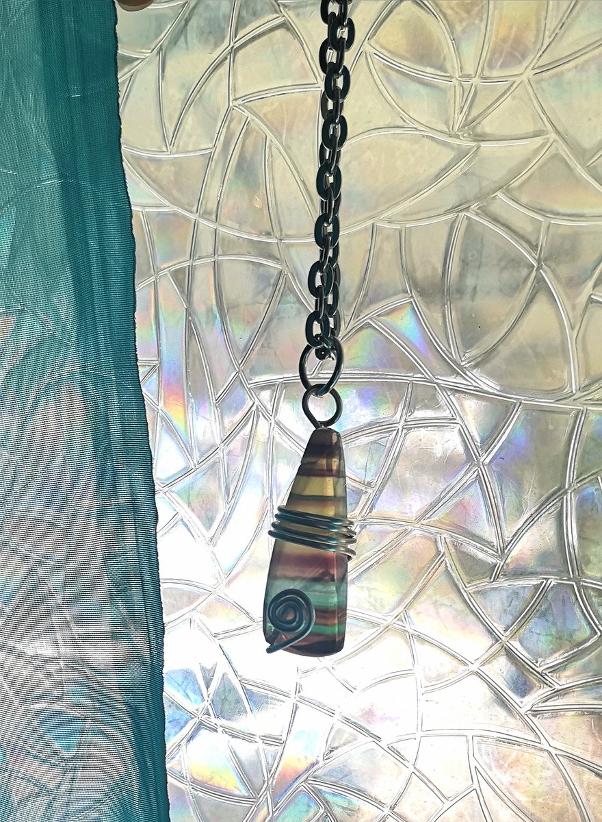 I have a ways to go before I perfect wire wrapping but wanted to share this beautiful #flourite stone with you. I'm so in love with the beauty of these things created by mama earth! #healingcrystals #shoplocal #shopcanadian #artisanmade