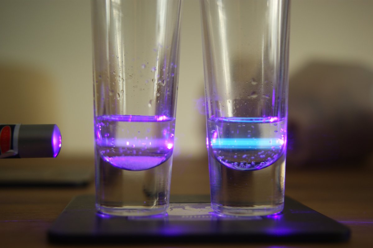 Why lasers? Because most modern microscopy methods use a principle called fluorescence. Basically, you shine light of a specific wavelength/colour on a material, it absorbs that light and it emits light back at a different colour(purple laser, blue fluorescence on the right)