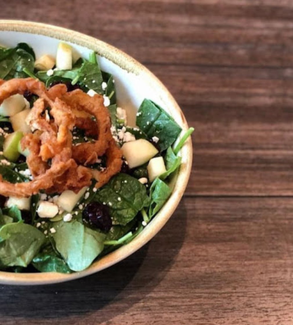 Looking for a healthy choice for Lunch? Look no further and order up our Spinach Salad. 
Goat cheese, dried cranberries, toasted almonds, champagne vinaigrette.