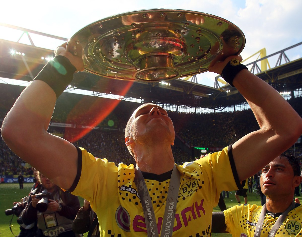 With 2 Bundesliga titles, a DFB Pokal trophy & a WC winners medal (the only Kevin to win the tournament) Großkreutz's trophy cabinet could be enough of a story, but it's how he got there & who he won it for that makes his story so special, and yes, that is his tattoo.