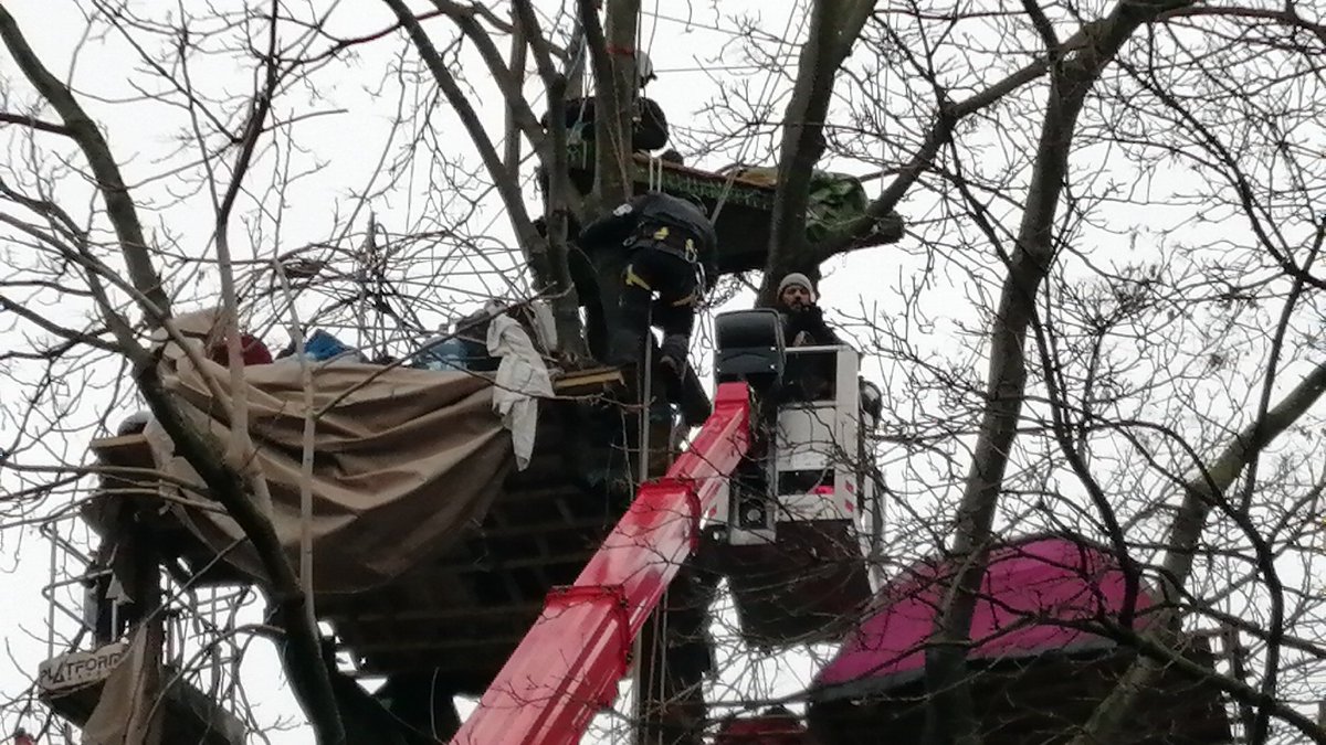 One of the protesters has been put in the cherry picker
