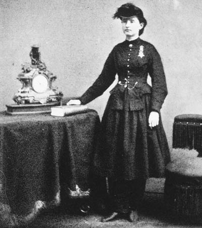 As a young woman, she began experimenting with various skirt-lengths and layers, all with men's trousers underneath. Her typical ensemble included trousers with suspenders under a knee-length dress with a tight waist and full skirt.