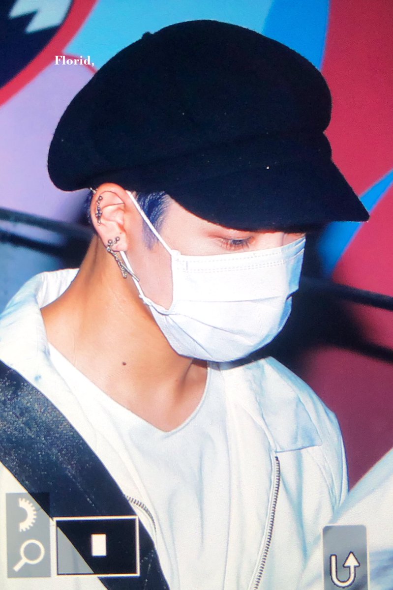 HONGJOONG TUCKING HIS HAIR BEHIND HIS EAR 