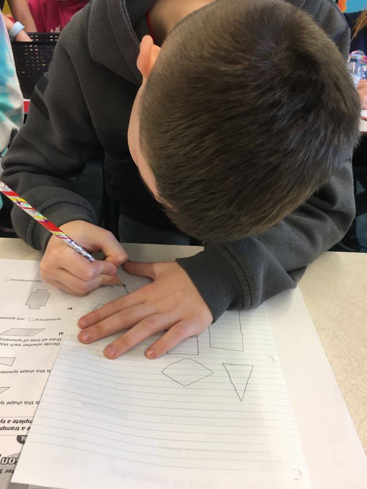 MissSquires4's tweet photo. More fun with grade 4's learning about symmetry using literacy blocks!
@sjboscoschool #grade4 #mathfun #symmetry #nlesdca https://t.co/yzqb9p1kSn