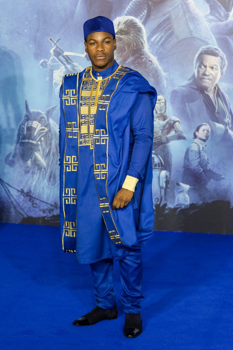 In a traditional West African agbada robe 