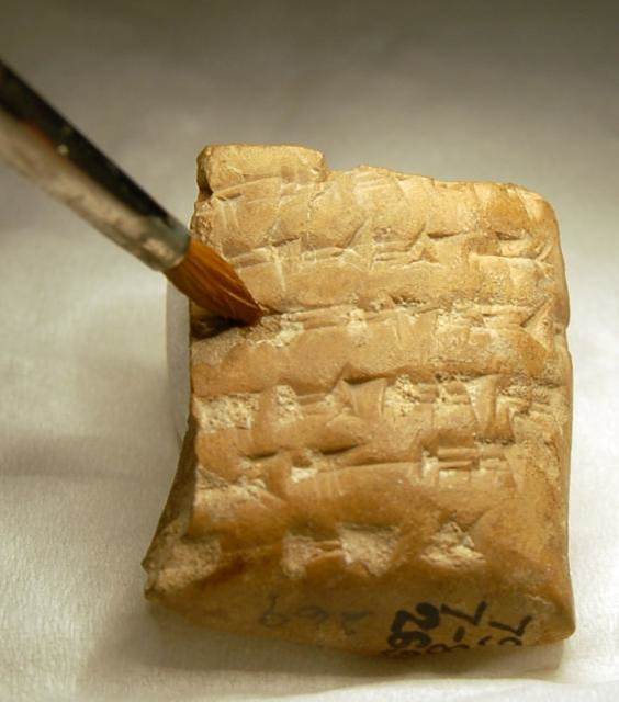 Ceramics conservators clean excavation dirt from the wedges of clay tablets bearing cuneiform inscriptions. Sometimes there are other encrustations. They can be soft or hard. Using a microscope and tools from a small wooden pick to a scalpel, they can clean the surface safely.