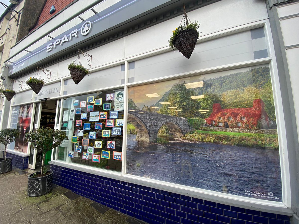 SparLlanrwst's tweet photo. Pleased with our new window blanking 🥰 A beautiful photograph of Bont Fawr, Llanrwst by Sheldon Thomas Photography, Llanrwst. Expertly printed and fitted by Ian &amp; Jennifer of Signz, Llanrwst. Complemented with pictures of Bont Fawr by plant Meithrin a Derbyn, Ysgol Bro Gwydir ❤ https://t.co/nTSww3xPiD