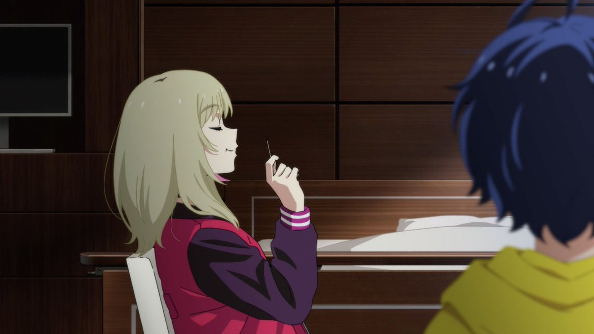 It's clearly a sign of her doubling down on her selfishness, taking food that was meant for Neiru and Ai, but it's also a visualization of her trying to reaffirm it to herself. Fortifying the wall she puts between herself and others.