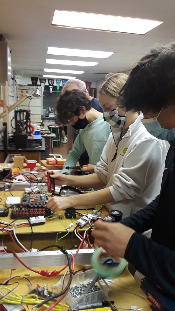 roaringstag's tweet photo. Masked up and wiring the new swerve drive robot. #GoTeam1997 #GoSTAGS https://t.co/utOQ9sXLSp
