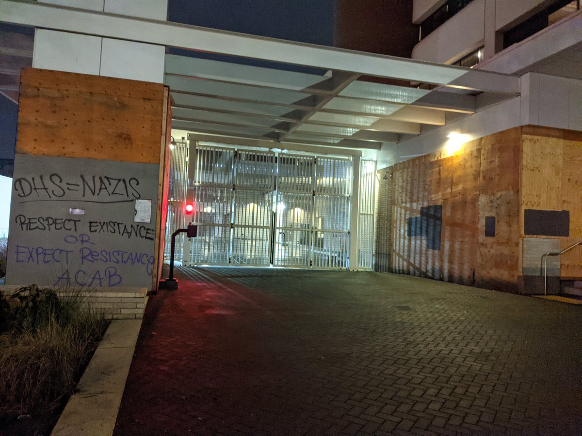 The ICE building is darker than usual. No floodlights. Maybe they are displaying the tiniest bit of self-awareness re: how deeply and profoundly fucked up it would be and also look for them to violently disperse a Holocaust Memorial