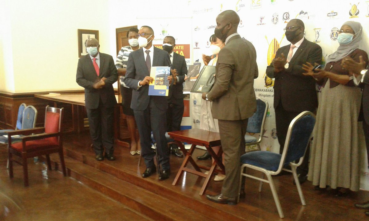 BugandaLandB's tweet photo. Mr. Mugabi Michael of Housing Finance Bank, Ms.Wind Shen from Guoji group and Omuk. Simon Kabogoza the CEO of Buganda Land Boar have signed an MOU to enable people access mortgage financing to acquire the affordable housing units being built at Sentema. #Sentema. https://t.co/k7Bl7PLykp
