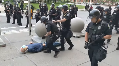 A Grand Jury chose not to charge two Buffalo police officers who pushed 75-year-old Martin Gugino to the ground (fracturing his skull) during a protest last June, Erie County District Attorney John Flynn announced