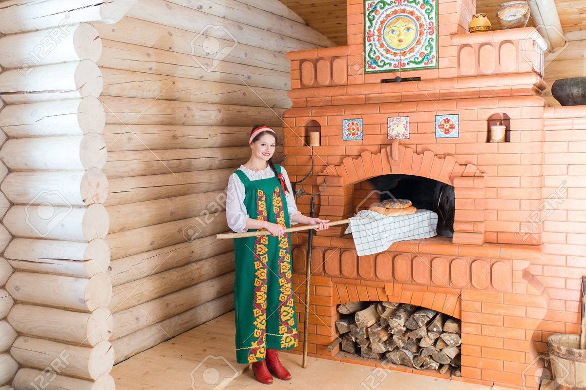 The Russian stove is a particularly beautiful type of masonry oven.Such old world charm!