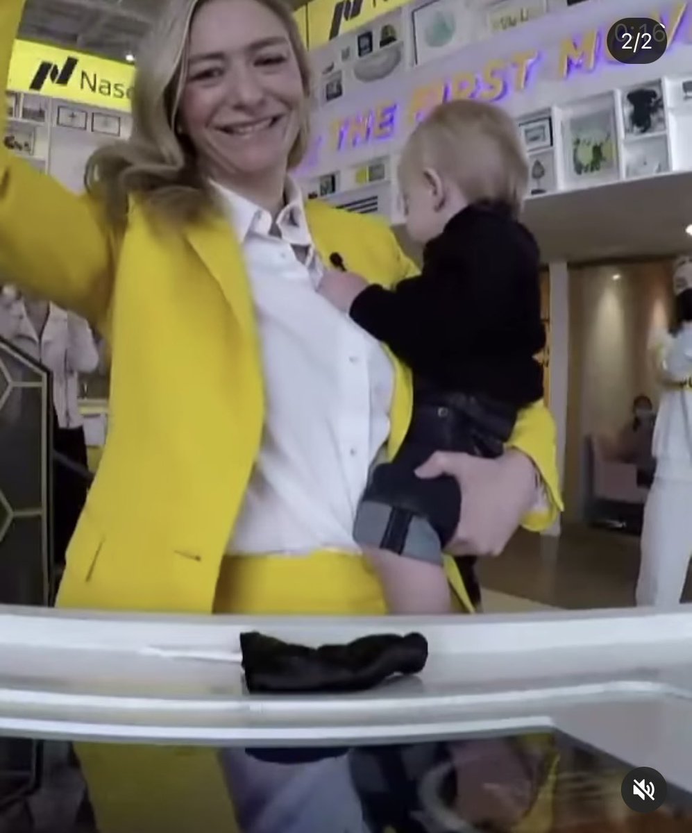 the POWER of these images 

child on hip 
killer yellow suit 
a self-made billionaire at the age of 31