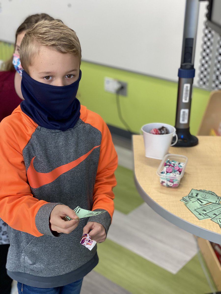 ksantoro19's tweet photo. We earned our first ‘paycheck’ in our Economics Unit. Students are learning about needs/wants and goods/services. They have to save their ‘money’ to spend on goods to decorate their Valentine bags. Today, they were tempted to spend some of their money.  #saveorspend https://t.co/jW9ybOkweW