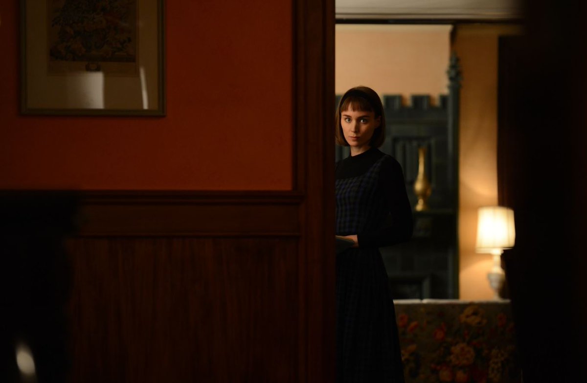 Doing the looking is Therese (Rooney Mara), a budding photographer whose day job is behind the counter at a department store. The shift in vocation from set designer in the novel to photographer in the film gives the shy, unassuming Therese the tools to amplify her gaze.