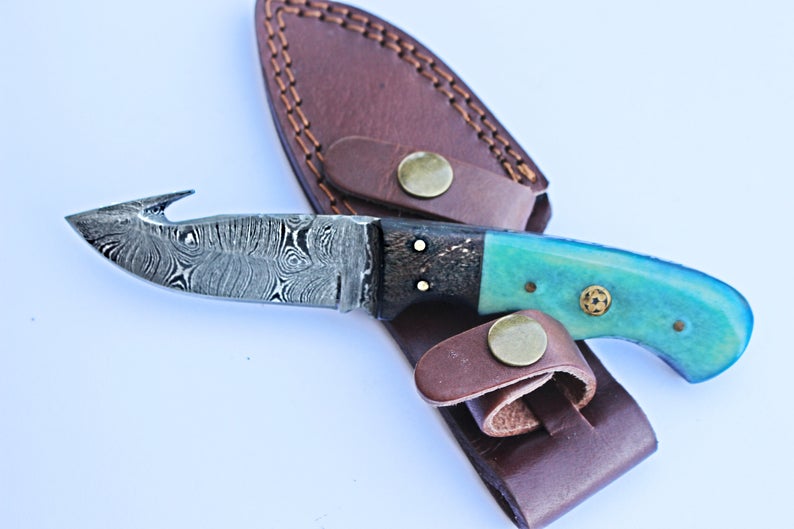 skinner.
damascus steel with patteren handle