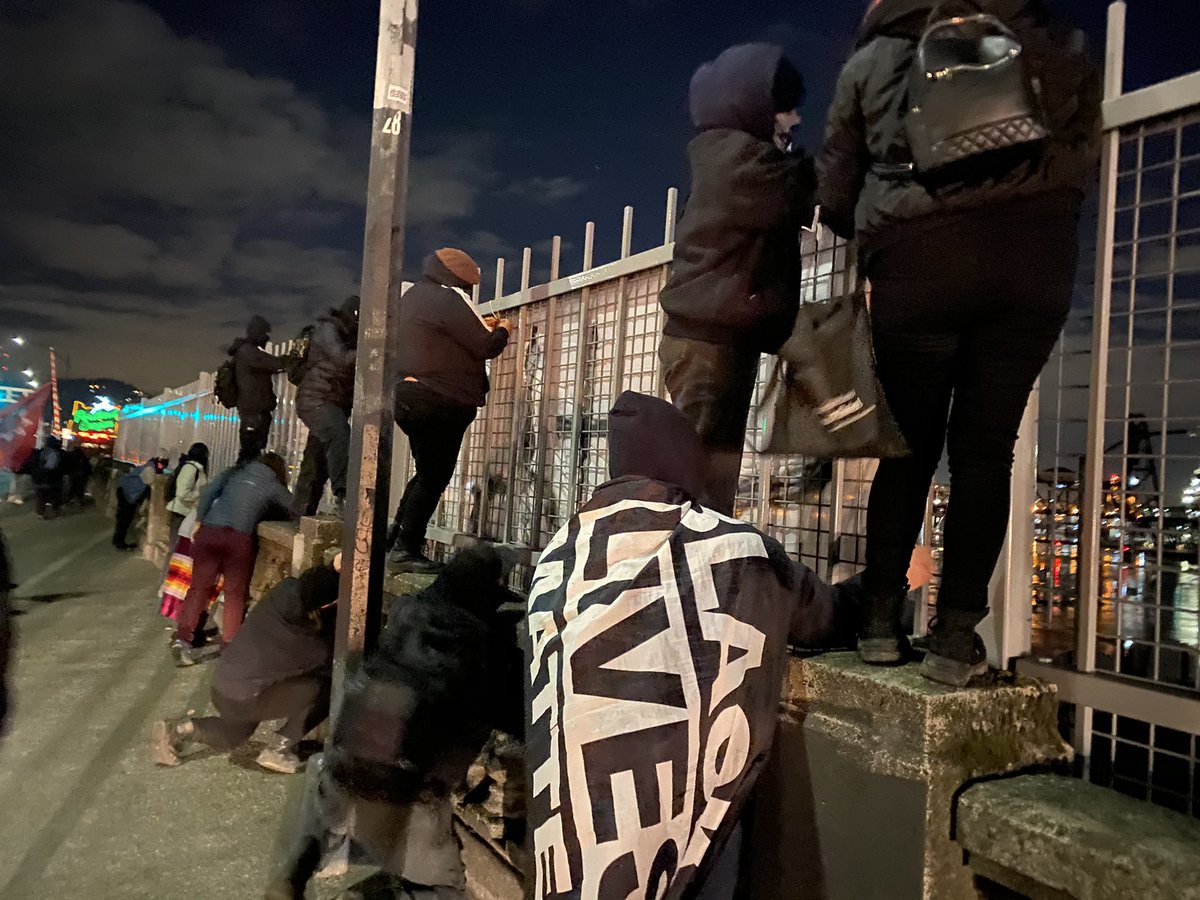 A banner has been dropped on the fence across the overpass. I cannot get a picture of it from the bridge that I am currently on, but it reads “Shut down DAPL!”