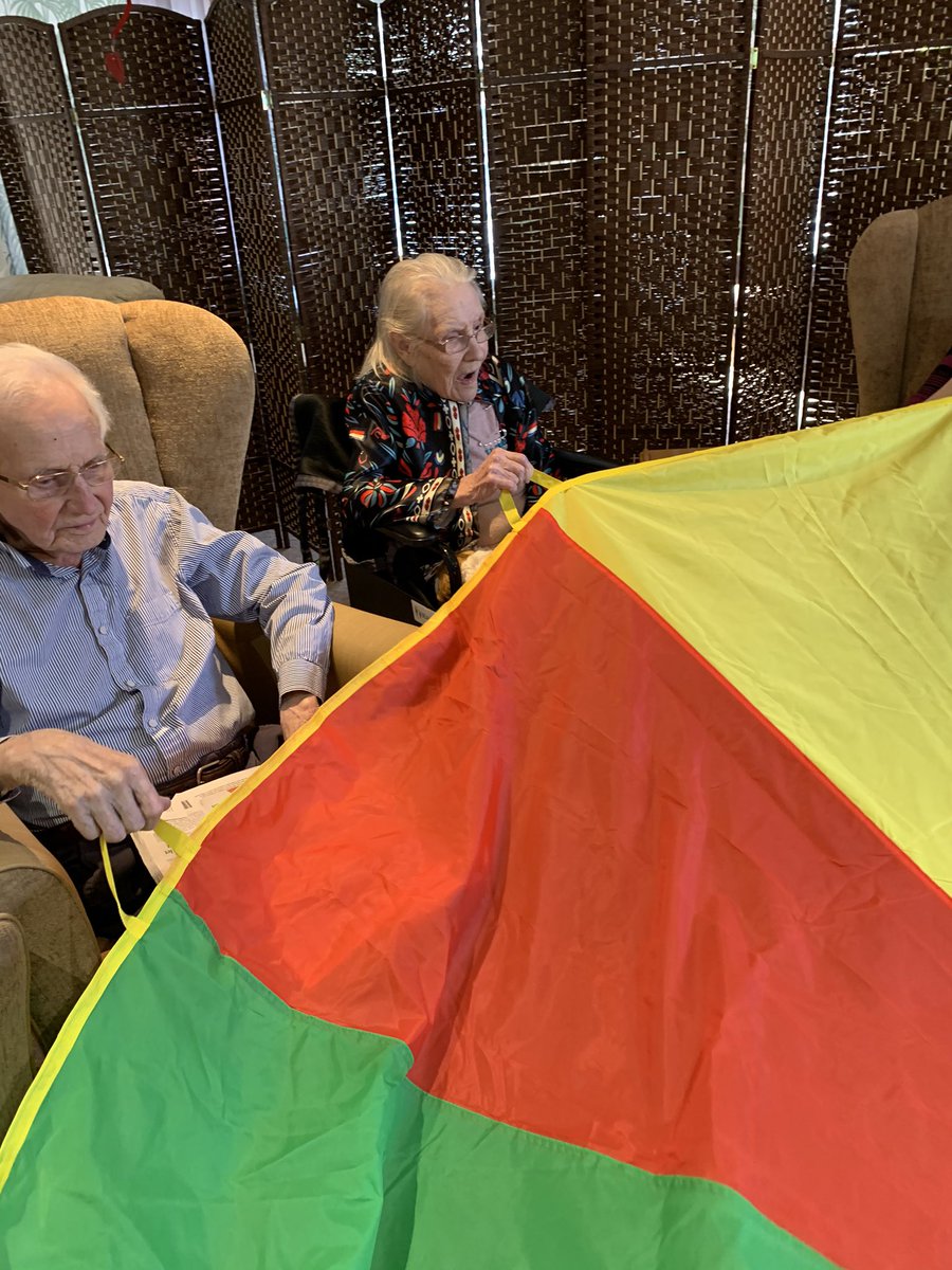 MossLoreta's tweet photo. Today residents enjoyed their games morning getting some exercise and having fun with the parachute! We all had great fun trying to see how high we could get the balls! @blackswancare 💙❤️ https://t.co/i6aFh6sYWQ