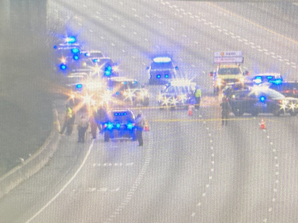 ChristieOnTV's tweet photo. At lease 1 person shot and killed on I-85 SB. 
This is a look at the investigation that has the interstate shut down completely. 
Notice the car on the right side angled in toward the median. That is not a police car. Several orange cones on the far left lane. #MorningRushATL https://t.co/7t1YbAefDj