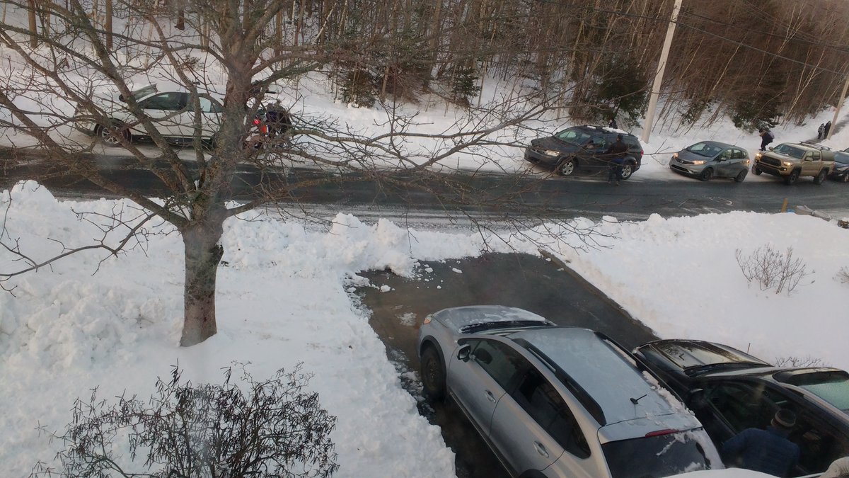 The plow left us a nice overnight surprise! Note: nothing in the neighbours driveways