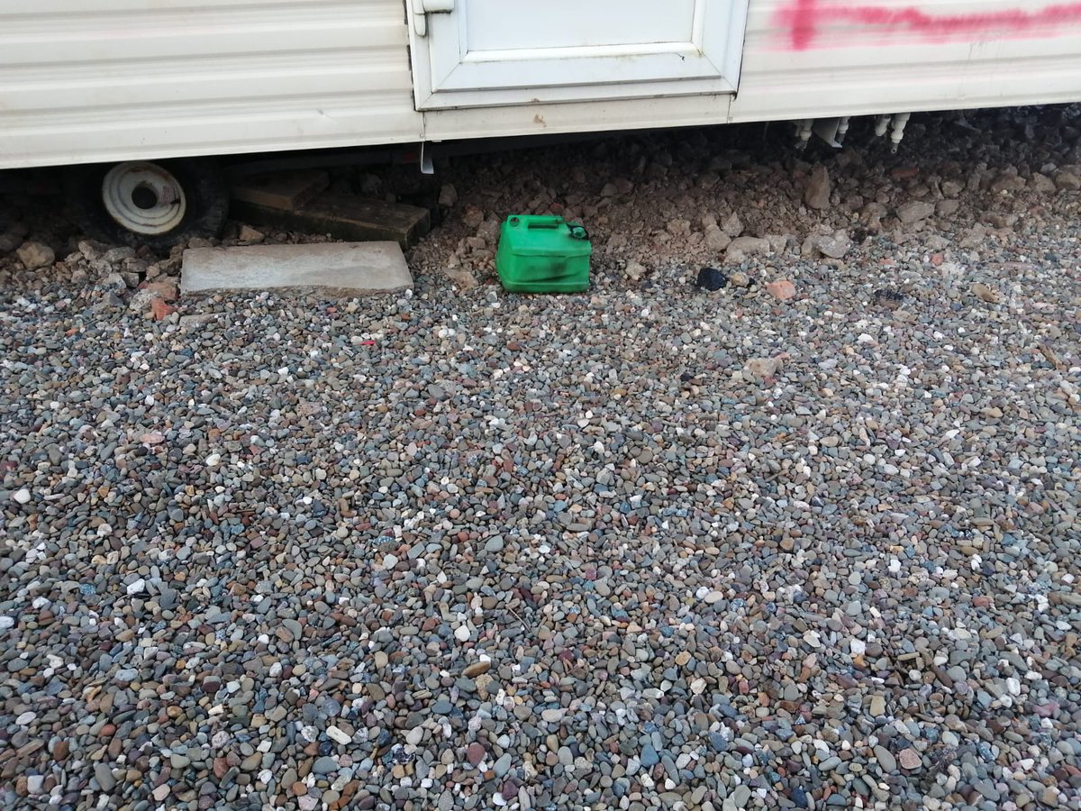 bowers_jake's tweet photo. Racist attack on a Gypsy home in the last few days. Notice the petrol can under the trailer door. Is this the natural result of @pritipatel 's performative prejudice unveiling plans for new anti-Gypsy legislation? https://t.co/qGwqSKpclC