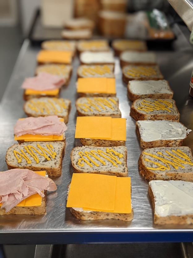 Our kitchen equipment grant program aims to help our CAPs lower their food program costs by providing them with much-needed kitchen tools. @Directions_FSGV recently received a bread slicer that has helped them make more sandwiches for their clients and reduce food waste! #Vancity