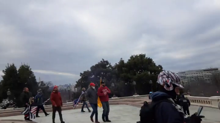 rocketman2001's tweet photo. More shots of #GreyFleeceGadsdenFlag &amp; #BetaKappaMaga approaching the NW plaza door from Parler video StkJb205ViGR. @capitolhunters @SeditionHunters @SeditionData @ParlerVideos https://t.co/T57qqBAIys
