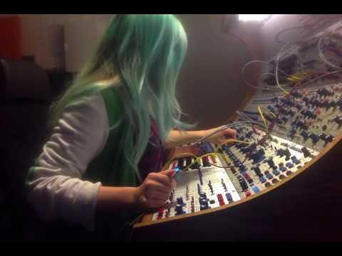 Thread of people posing in front of the Buchla at EMS Stockholm.