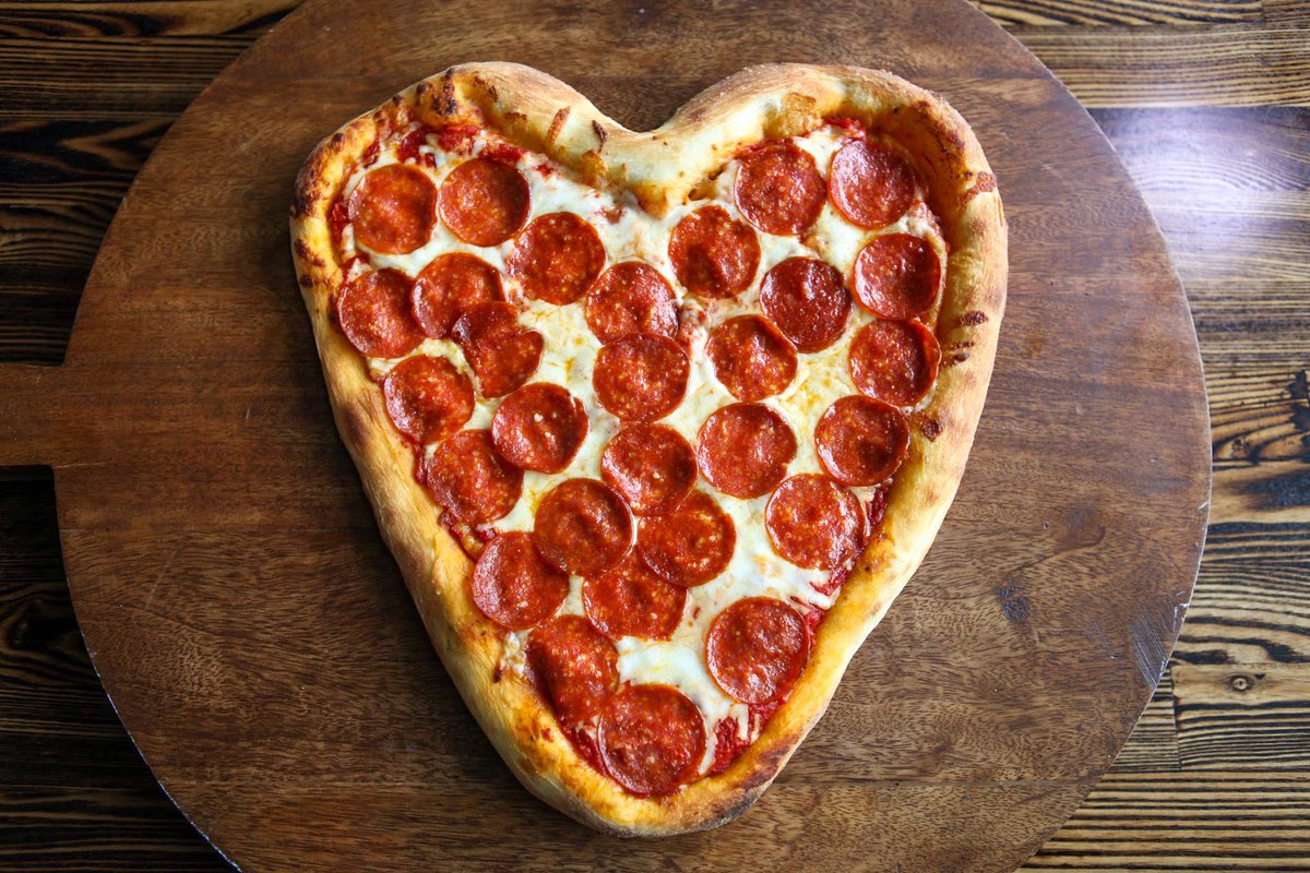 zpizza's tweet photo. Pizza is a love language, right? 🍕❤️ Show that special someone in your life how much you love them by sending them one of our heart-shaped cheese or pepperoni pizzas! 

Give us a call or make a request in the notes on your online order for “heart.” L and XL pizzas only. https://t.co/yLADyo8hJO