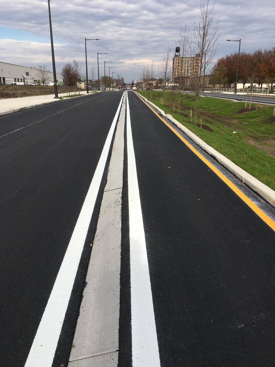 StreetsPhila's tweet photo. Philadelphia set to debut first-ever raised concrete bike lane in spring as part of American Street Redevelopment Project https://t.co/9NTYEvQc4m https://t.co/f7VsT1sVJ1