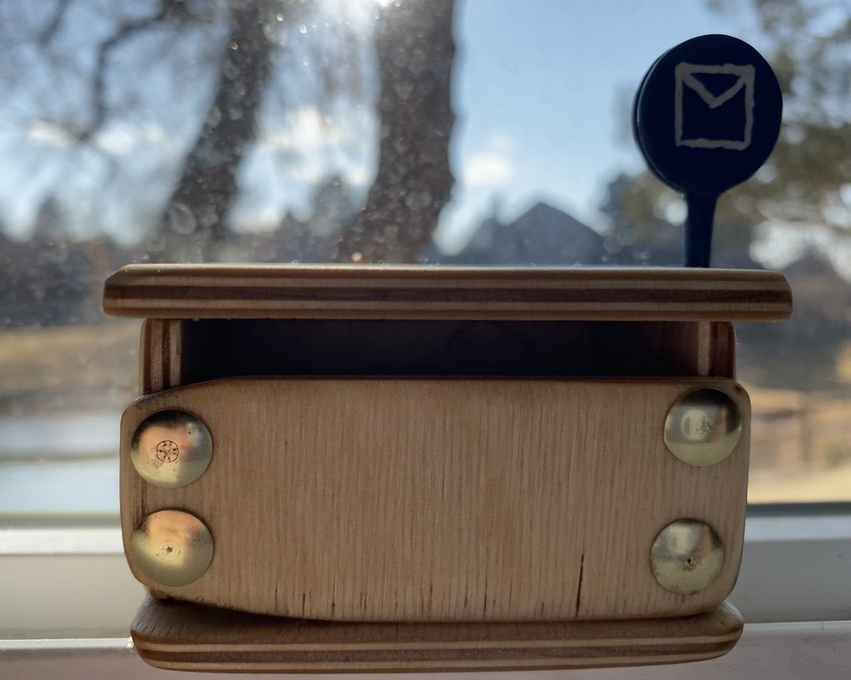 WallflowerPlays's tweet photo. My husband made me the cutest thing for Valentine’s Day. It’s modeled after the mailbox in Animal Crossing, and when it’s plugged into a power source the little flag pops up when I get mentioned on Twitter! 🥺❤️  
#ACNH #AnimalCrossing https://t.co/QnXnaAcS79