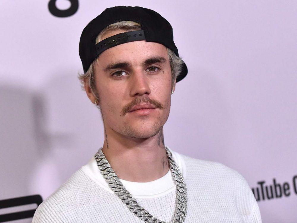 Justin Bieber celebrates after Maple Leafs sweep Canucks