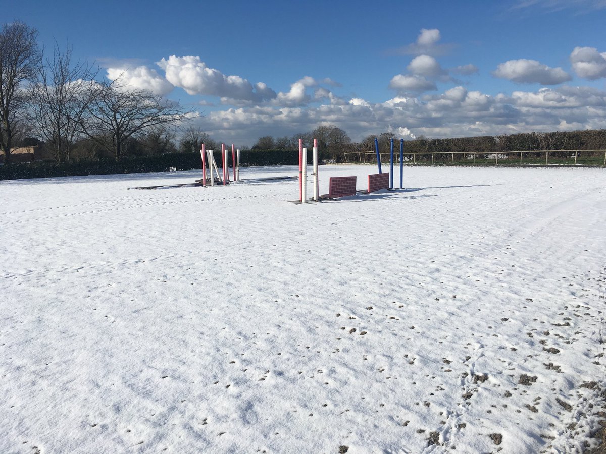 Well the arena looks very pretty in the sun..... but it’s not much use!! Beautiful but freezing! #rollonspring