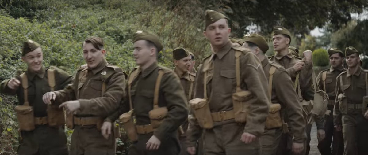 I love all the little hints at the dark shadows ahead, war is coming.These soldiers look good, they're young and have proper short 1930s haircuts.They often get this detail wrong in films.