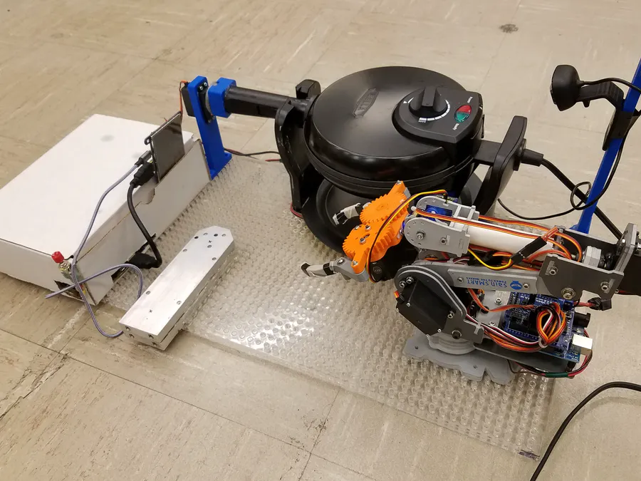  #Vision is a robot that makes waffles. (Here are the directions how to make it because the Internet is awesome:  https://create.arduino.cc/projecthub/314391/waffle-robot-9b3a9e)