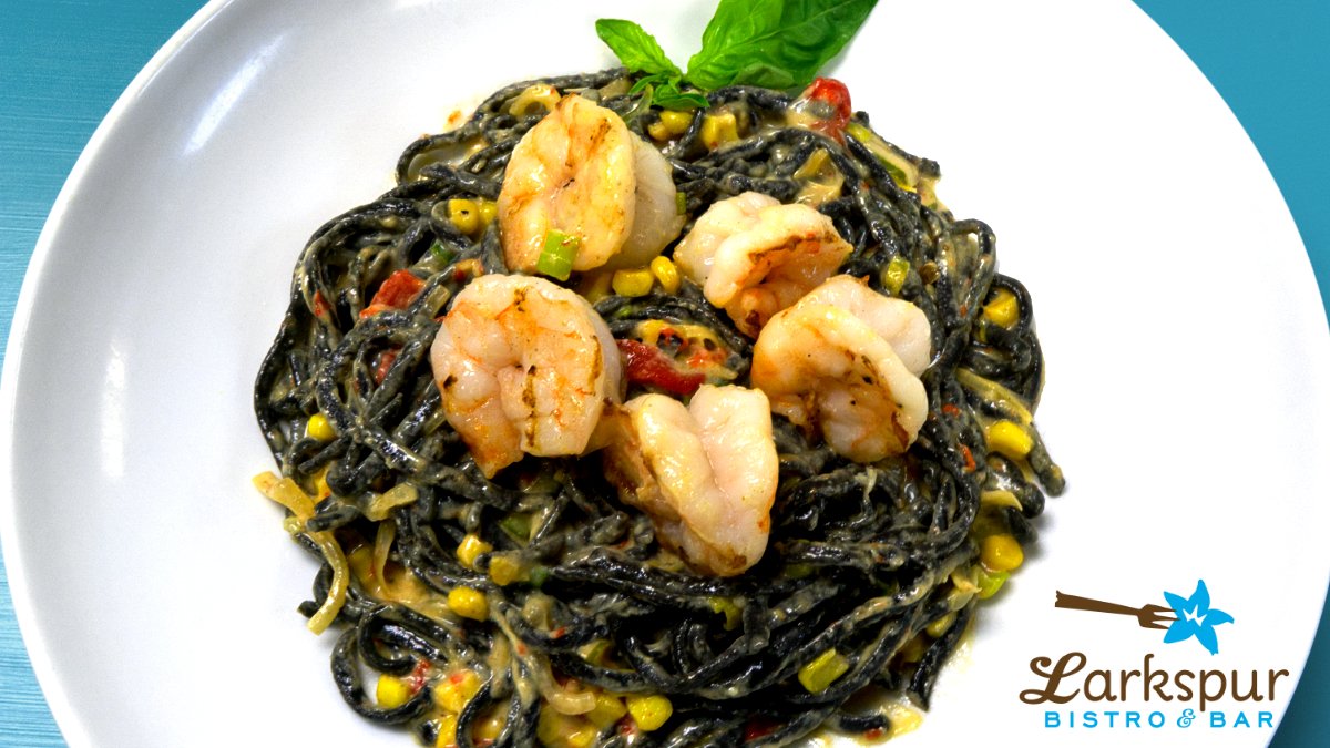 We have a fantastic dinner special this weekend! Squid Ink Linguini tossed in an heirloom tomato sauce with sherry deglaze, sweet corn, and bell pepper. Topped with plump shrimp.