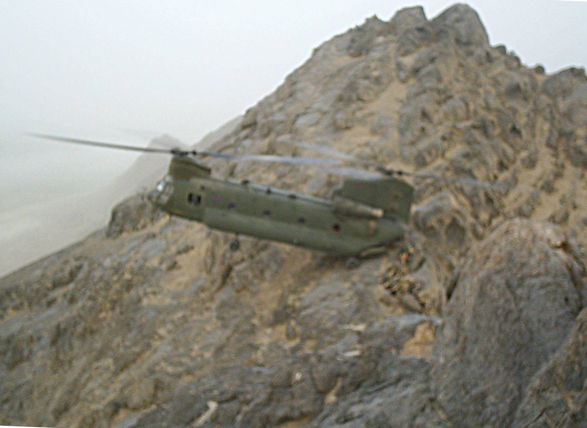 Photo taken in 2008 by my sniper team.

Female pilot. This is ninja level flying. 

Don't tell me women are bad at parking.