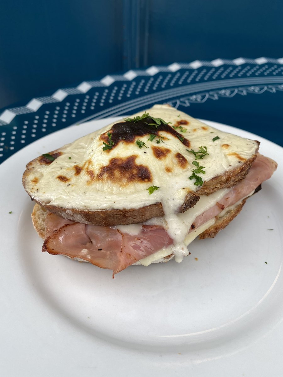 Brunch at a French café. That’s a cinnamon roll made like a croissant, and it’s as amazing as it sounds. He had a Croque Madame sandwich, which is a hedonistic mixture of toasty bread, cheese, ham, and a runny-yolk egg, which is also as amazing as it sounds.