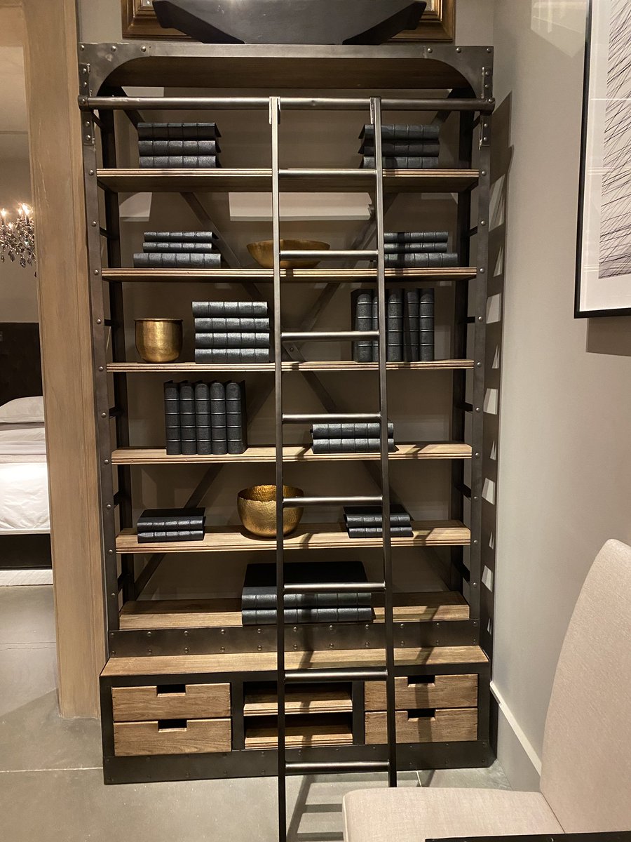 We went furniture shopping. This is the bookshelf I REALLY REALLY WANT, so I sure hope my next series pushes my income waaay up so I can afford one of these.I mean two of these. (At RH Austin, Restoration Hardware’s amazing showroom)