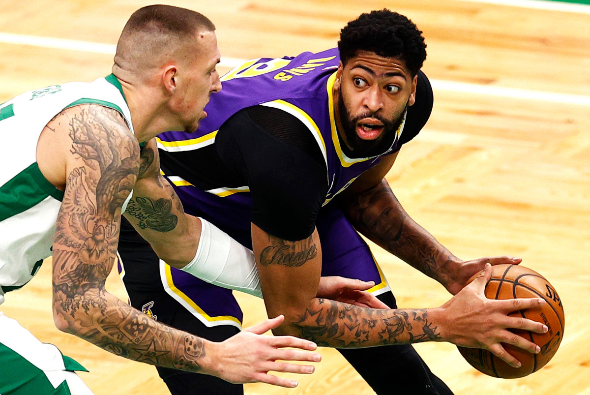Anthony Davis returns in style as Lakers nip Celtics