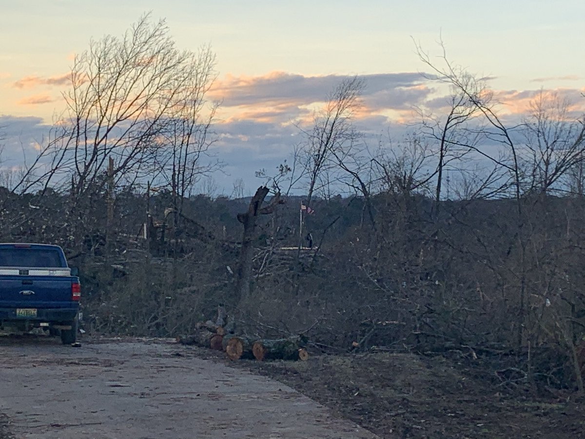 garyhog's tweet image. Sunset January 30, 2021, Fultondale, AL. Looked out from the yard we just finished clearing and saw a beautiful sunset with an American flag waving in the breeze amid the destruction. @spann
